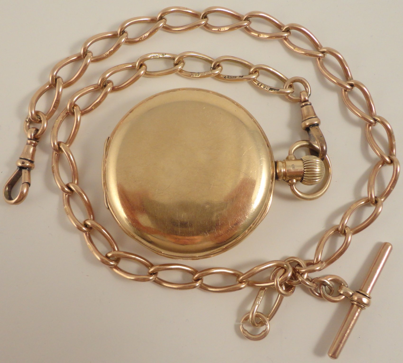 9ct rose gold half hunter pocket watch and 9ct albert watch chain Ian