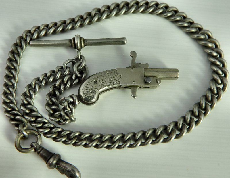 Antique pocket watch chain with rare decorative fob Ian Burton