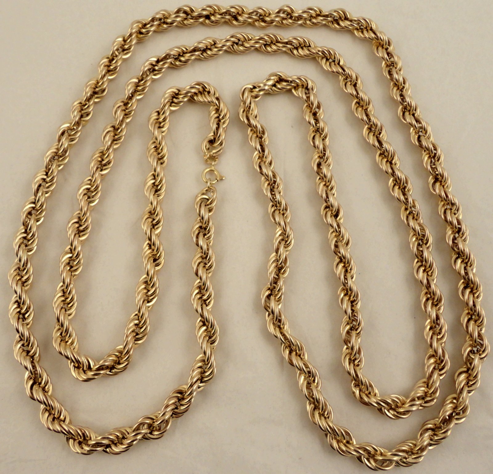 A massive and heavy 9ct gold 54 inch rope chain necklace Weighs 95 ...